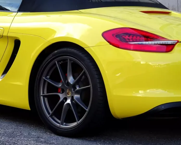361552030-yellow-convertible-porsche-car
