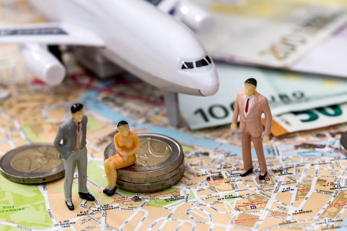 Airplane with map euro and miniature toy people